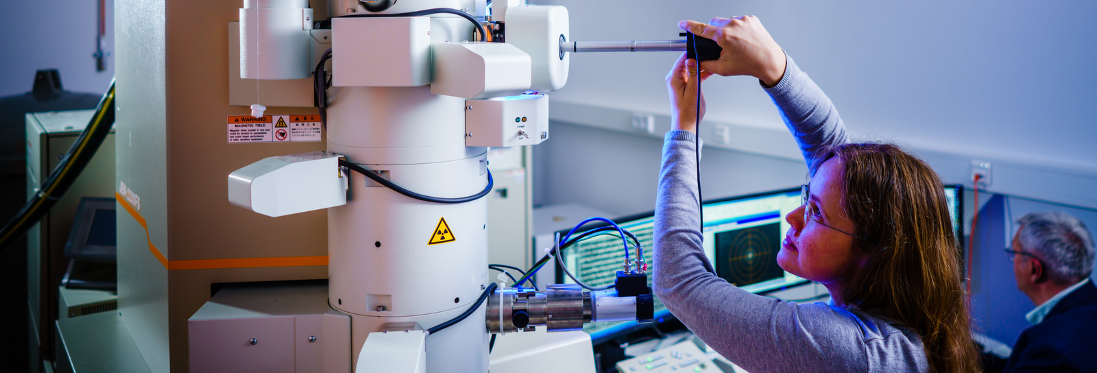 Dr. Ennen is working at the transmission electron microscope.