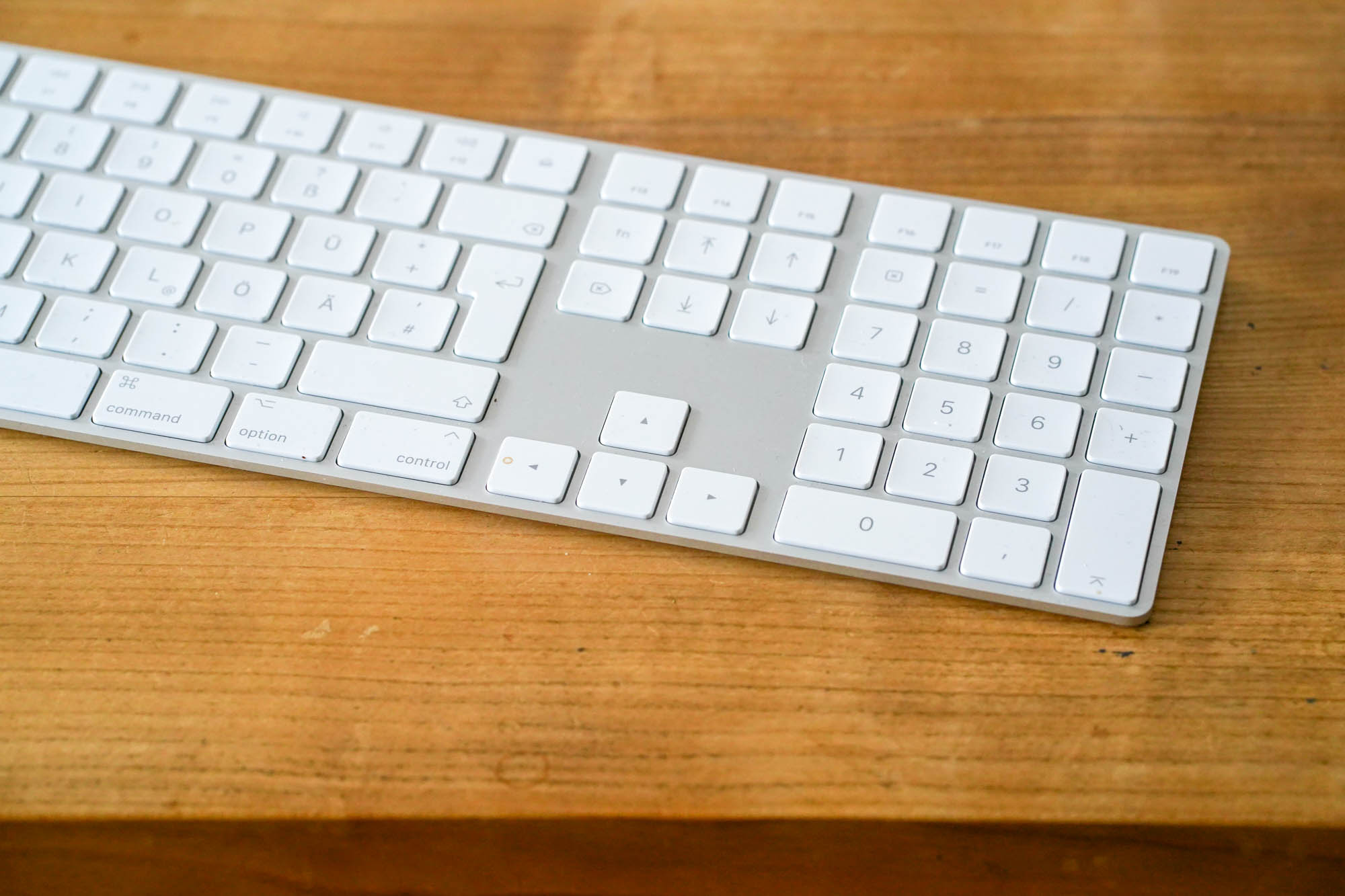 A white keyboard with some letters missing